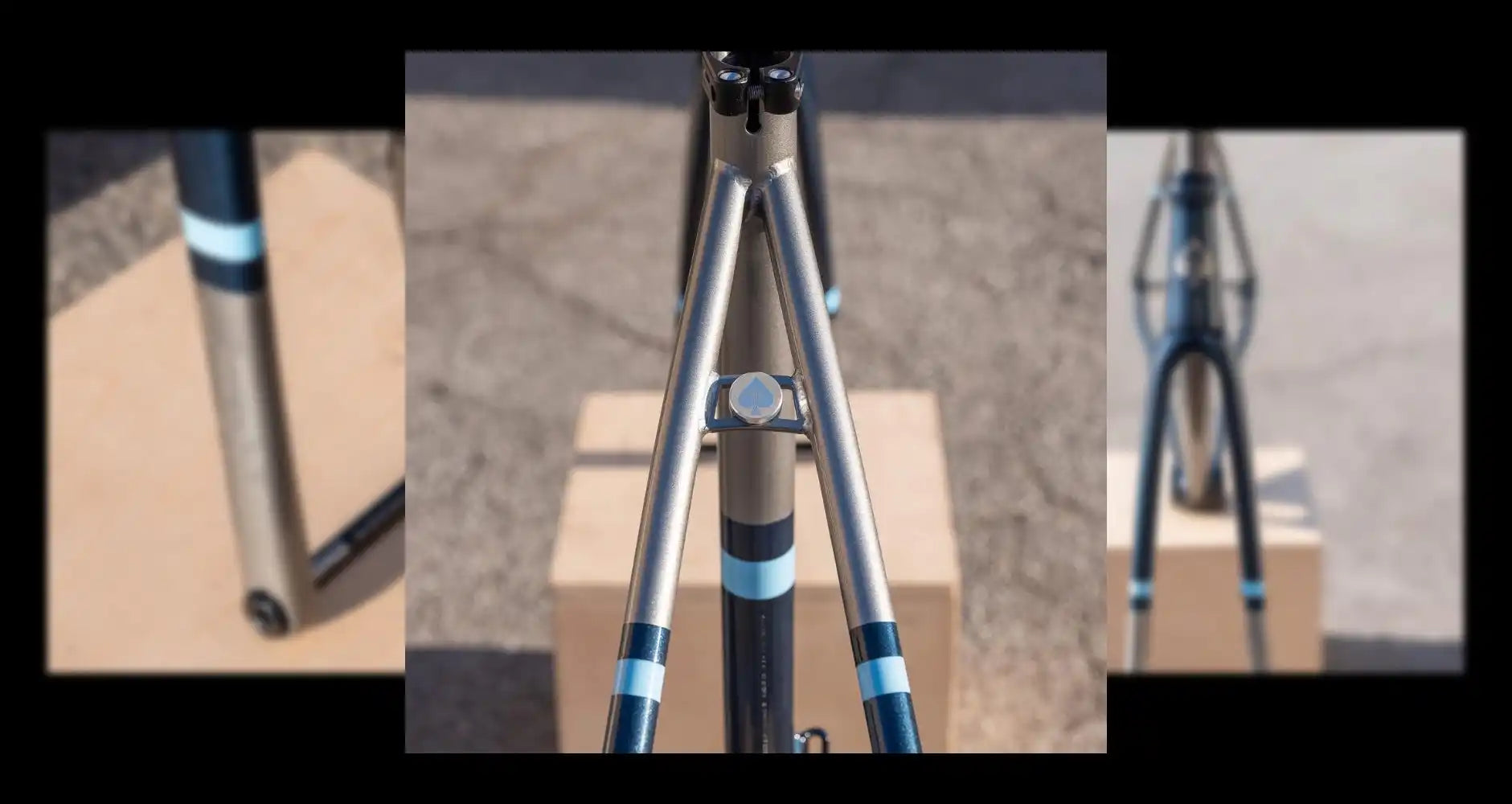 Silver and blue camera tripod with adjustable legs.