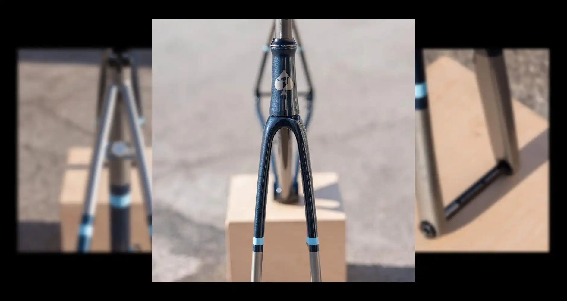 Blue metallic bicycle fork with chrome accents.