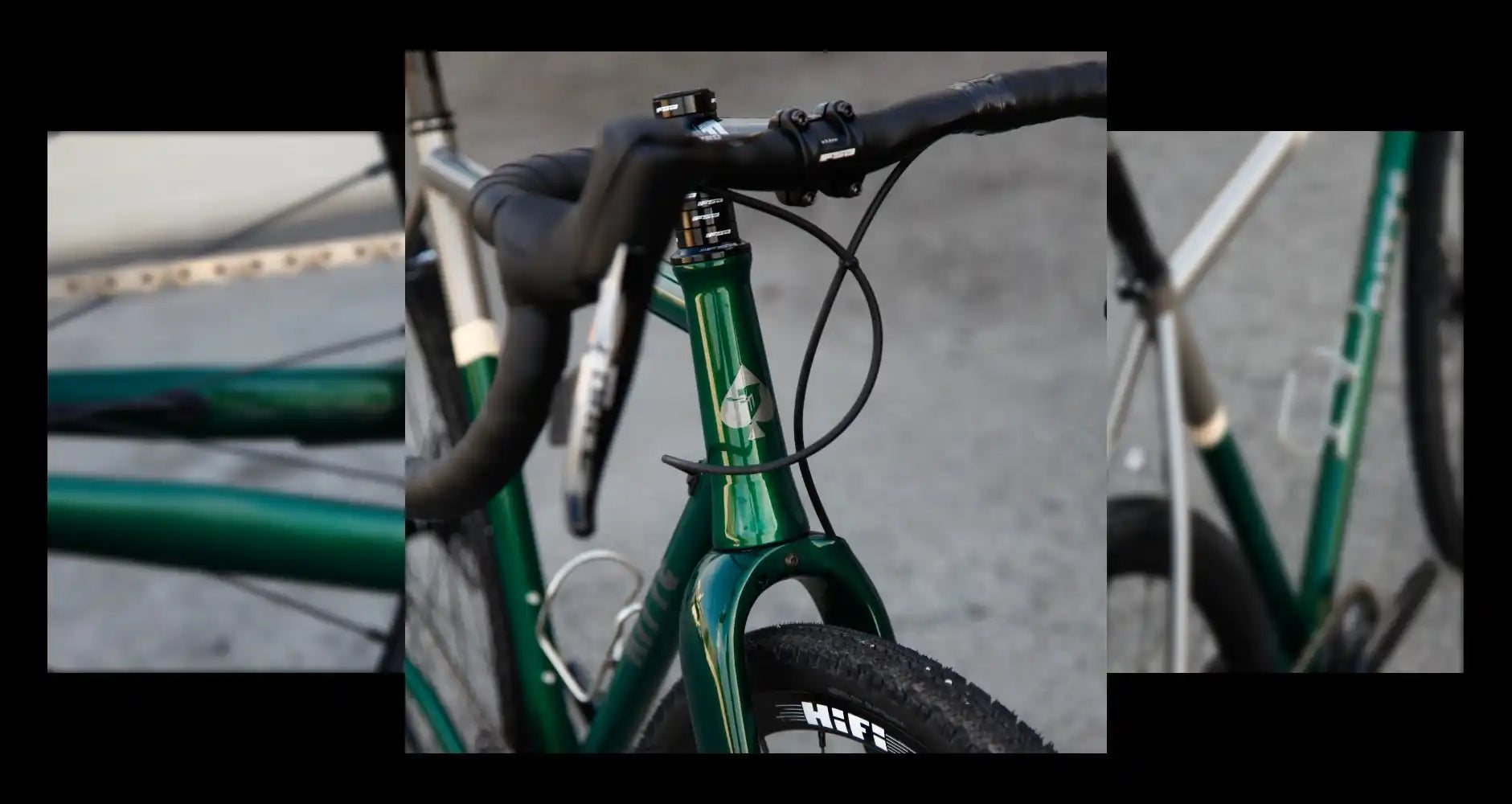 Green bicycle frame with black handlebars and tires.