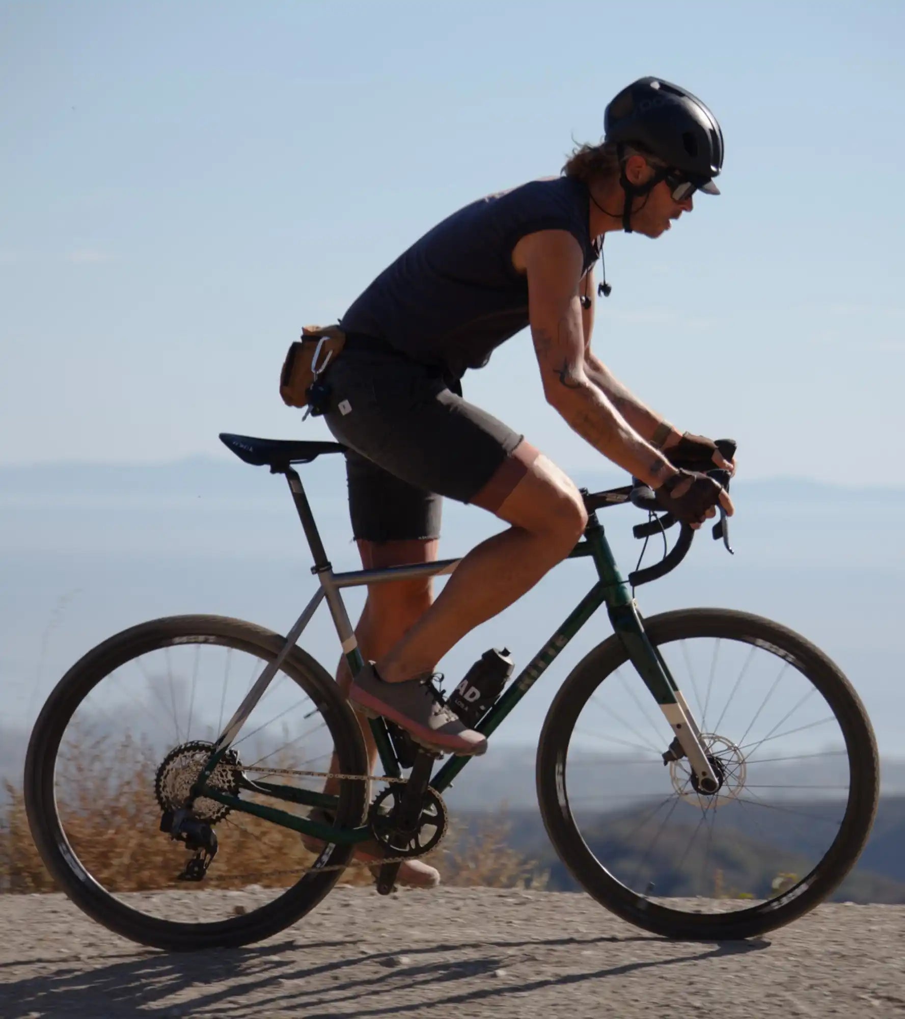 Modern road bike with disc brakes and drop handlebars.